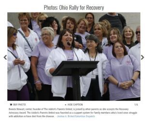 Group image of some old woman speaking on the mic